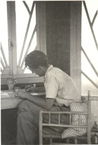 George Orwell at his desk. Source: http://orwelldiaries.wordpress.com/biography/